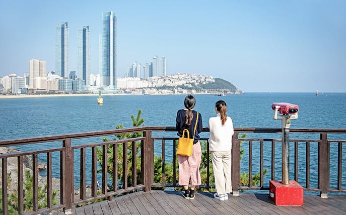 Viewing platform overlooking Haeundae Beach and skyscrapers in Busan, South Korea.