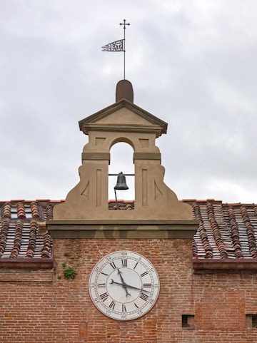Clock tower detail at Sinopie Museum, Pisa, Italy.
