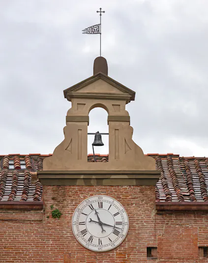Clock tower detail at Sinopie Museum, Pisa, Italy.