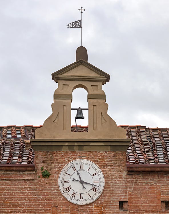 Clock tower detail at Sinopie Museum, Pisa, Italy.