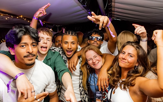 Group of friends enjoying a lively boat crawl in Split, Croatia.