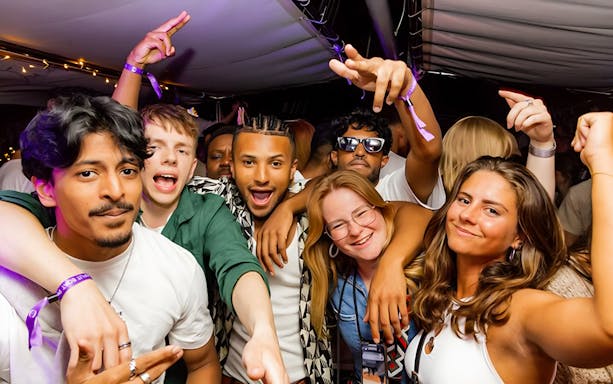 Group of friends enjoying a lively boat crawl in Split, Croatia.