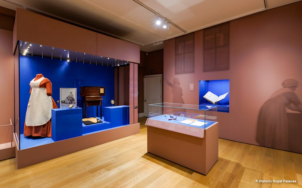 Kensington Palace exhibit featuring historical clothing and artifacts from Untold Lives.