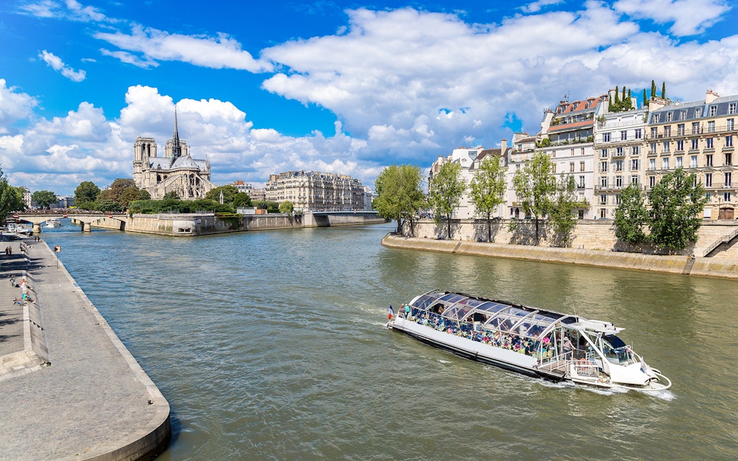 Seine River cruise near Notre-Dame Cathedral in Paris.