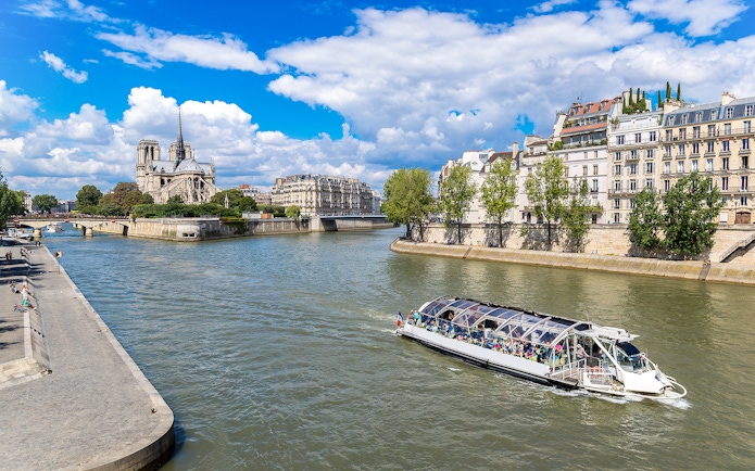 Seine River cruise near Notre-Dame Cathedral in Paris.