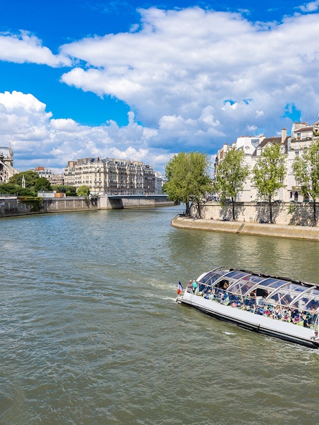 Seine River cruise near Notre-Dame Cathedral in Paris.