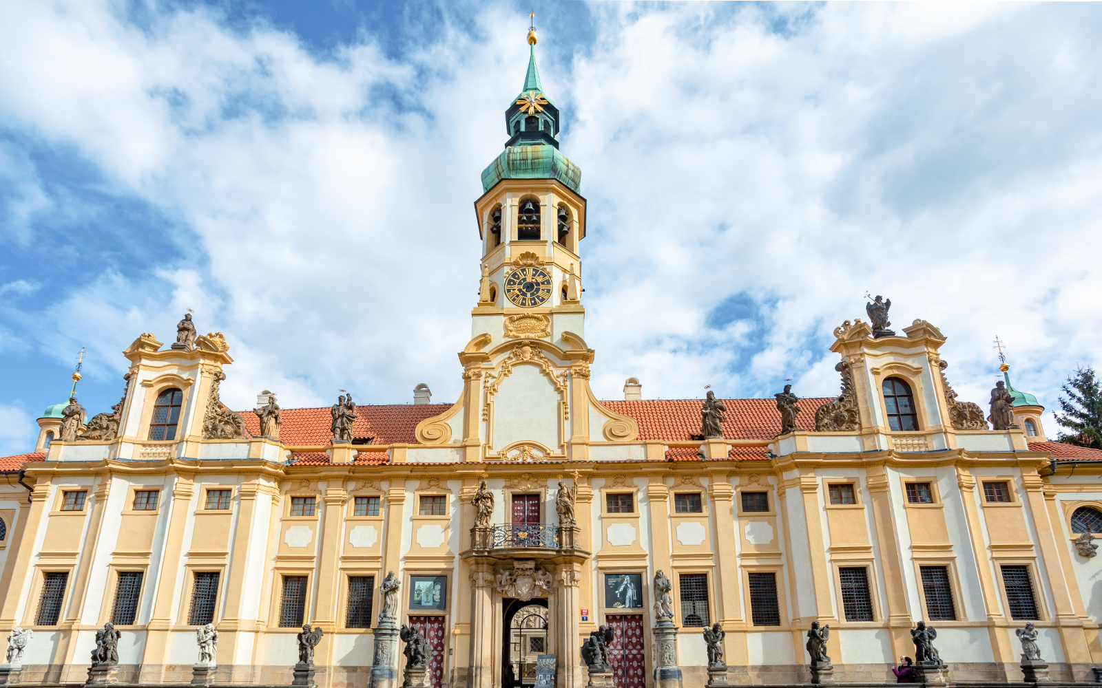 Loreta Monastery, pilgrimage destination in Hradcany, district of Prague. Cloister, the church of the Lords Birth, the Santa Casa and clock tower with famous chime