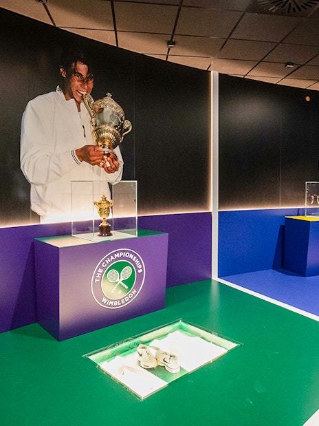 Wimbledon and US Open trophies displayed at Rafa Nadal Museum Xperience.