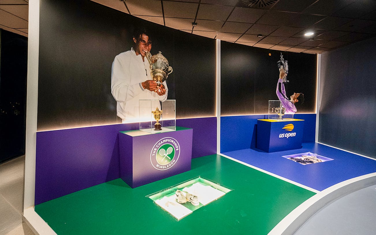 Wimbledon and US Open trophies displayed at Rafa Nadal Museum Xperience.