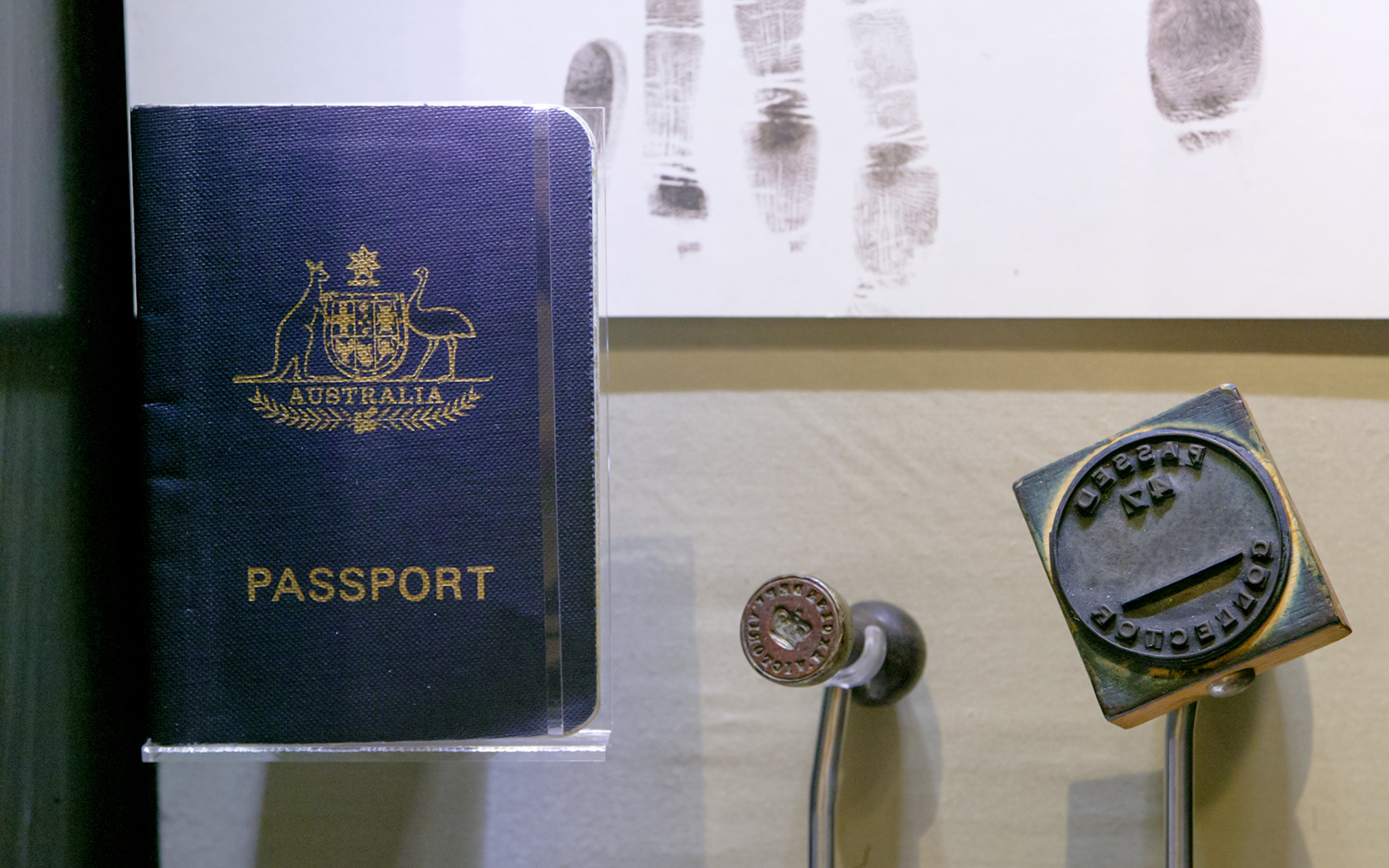 Australian passport and border control stamp at Immigration Museum tour.