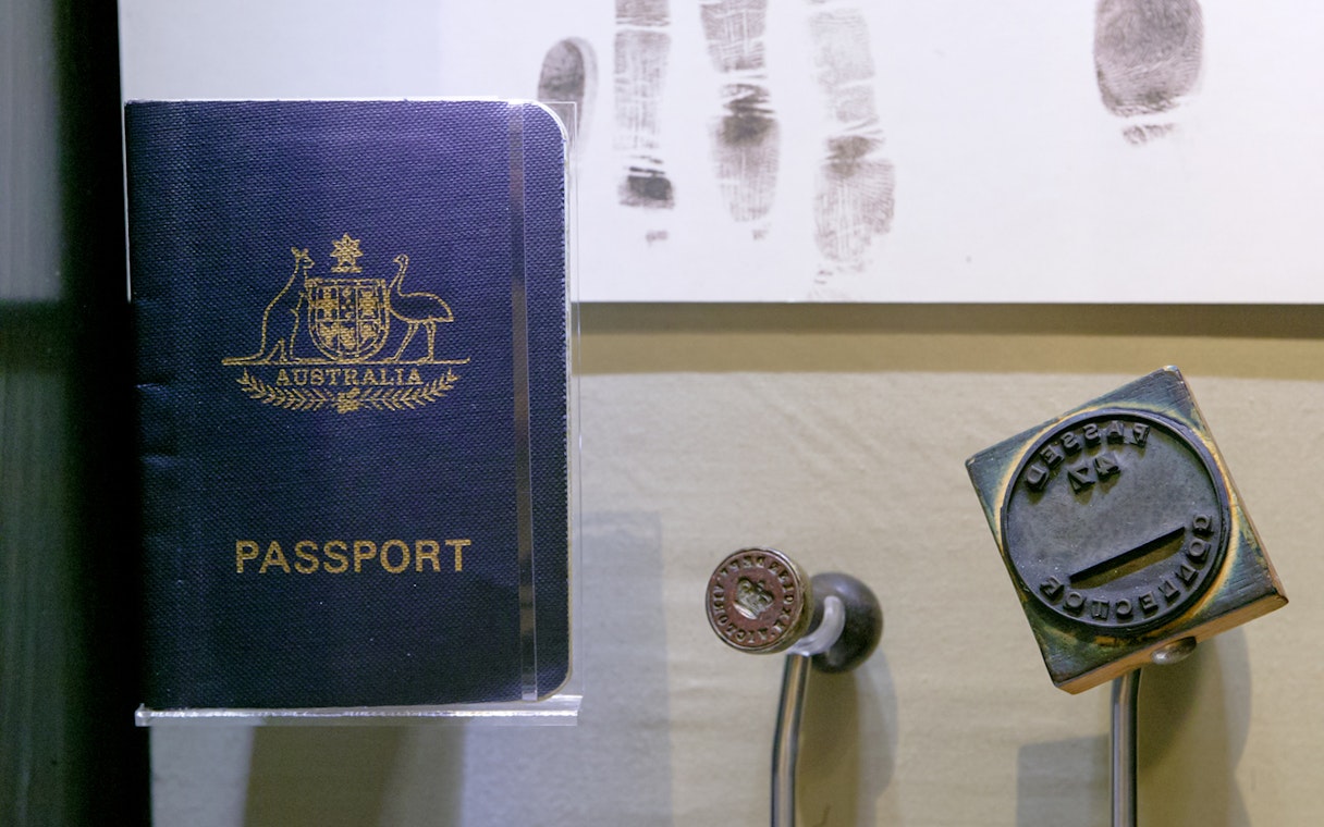 Australian passport and border control stamp at Immigration Museum tour.