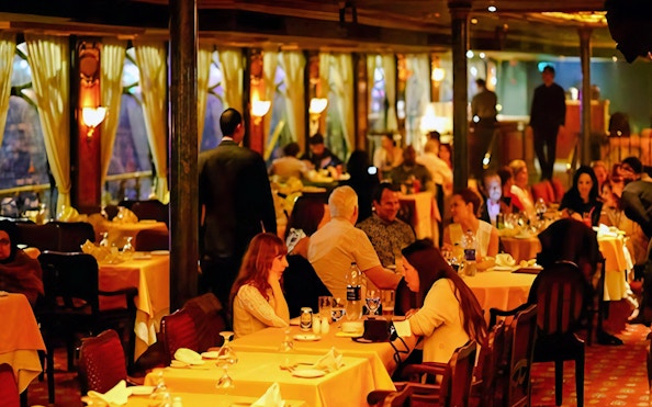 Tourists dining on a Nile River cruise ship.