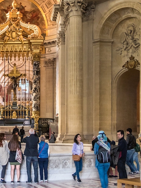 Visitors viewing Napoleon's Tomb at the Invalides, Paris Army Museum.
