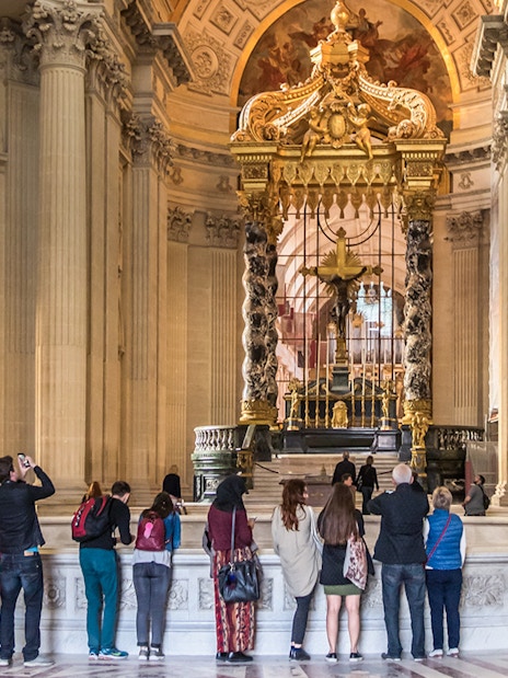 Visitors viewing Napoleon's Tomb at the Invalides, Paris Army Museum.