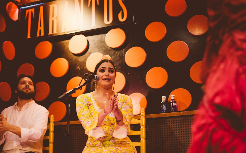 Flamenco artist clapping at Los Tarantos Flamenco Show in Barcelona.