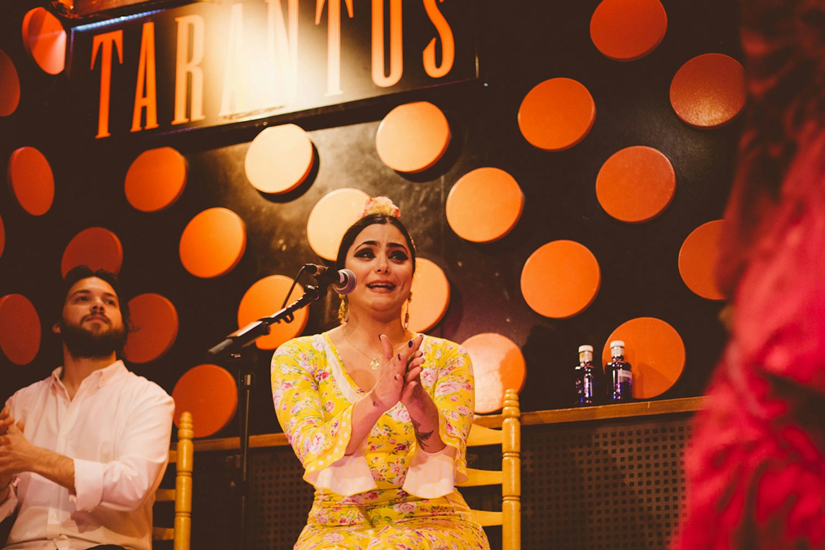 Flamenco artist clapping at Los Tarantos Flamenco Show in Barcelona.