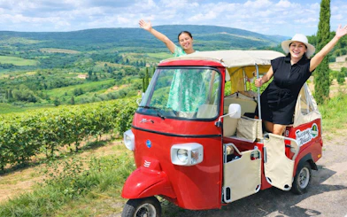 Tuk Tuk tour through Chianti Hills with local guide near San Gimignano, Italy.