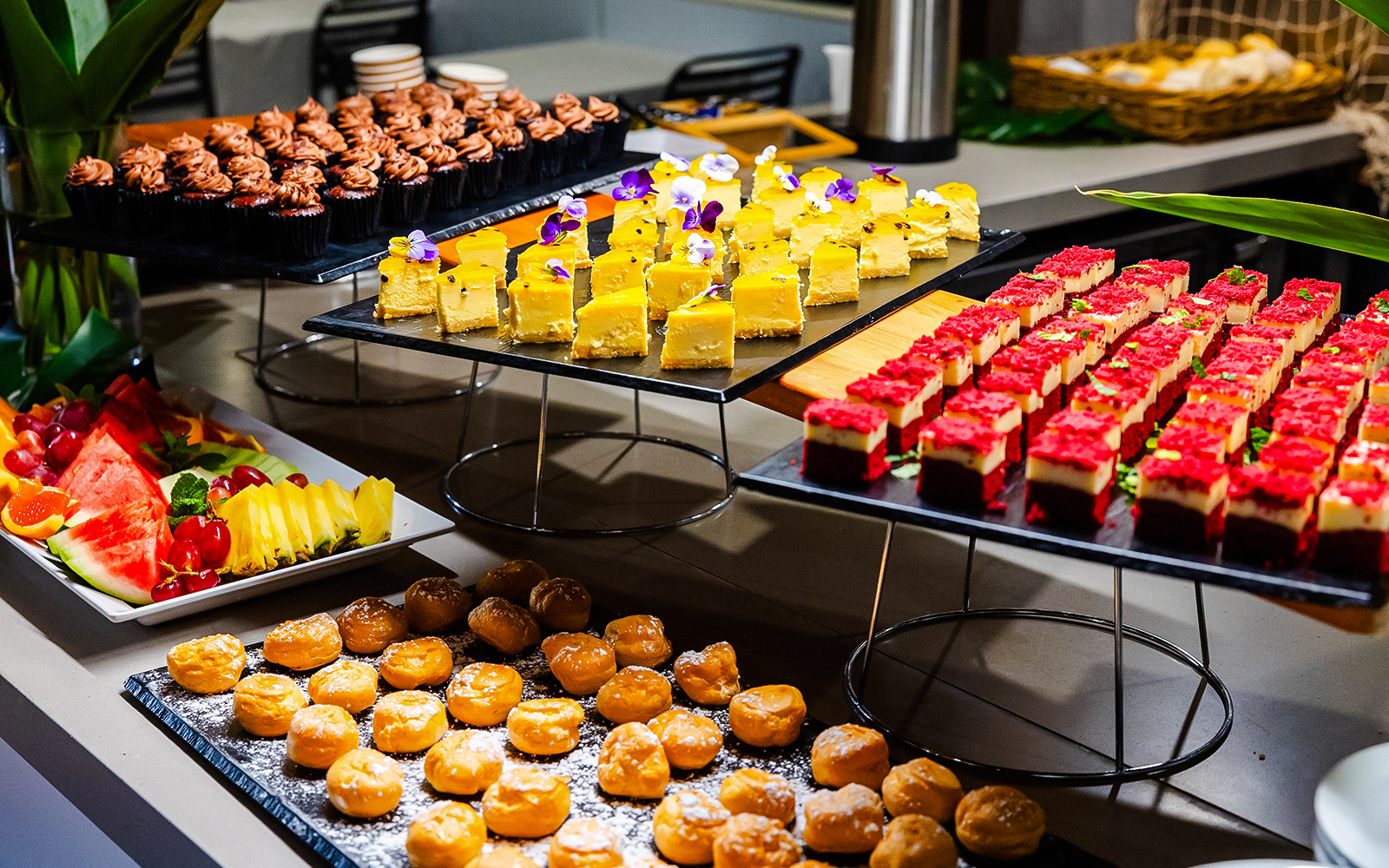 Buffet spread with desserts and fruit on Gold Coast sightseeing cruise.