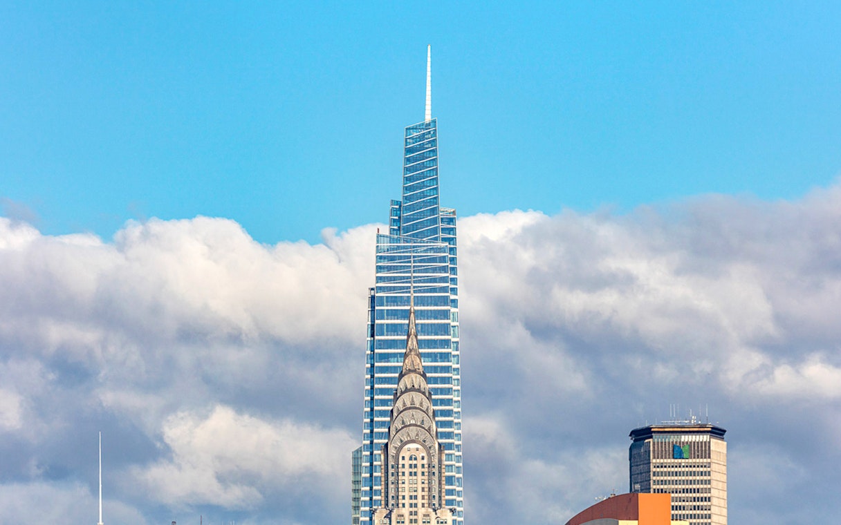SUMMIT One Vanderbilt skyscraper with city skyline in New York City.
