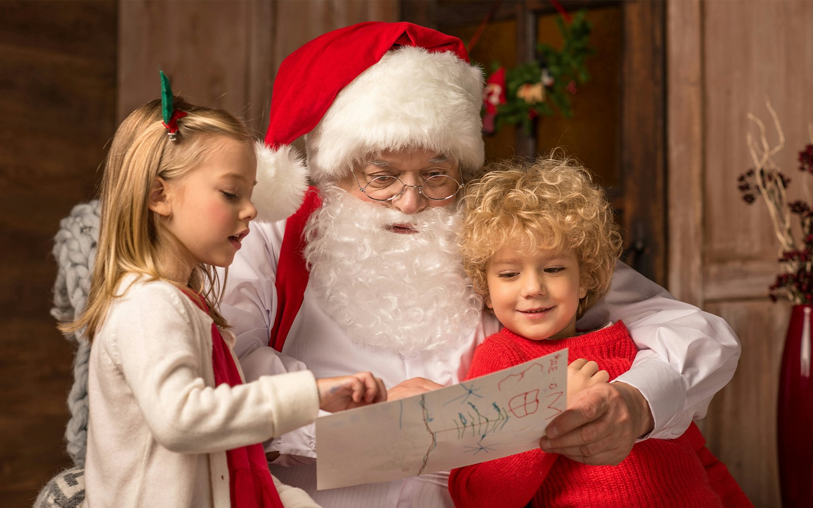 Santa interacting with children