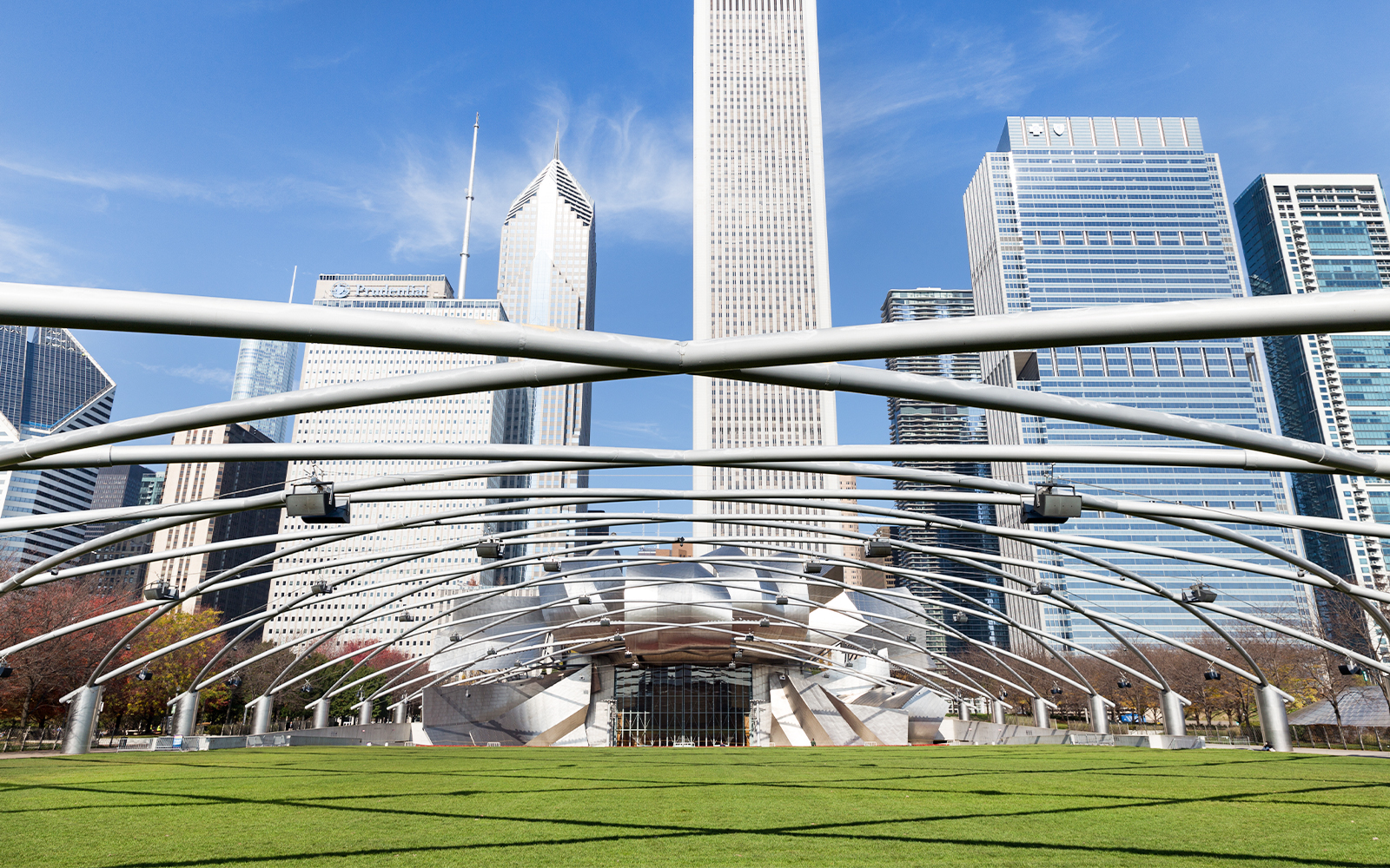 Millennium Park entrance with Chicago skyline in the background.