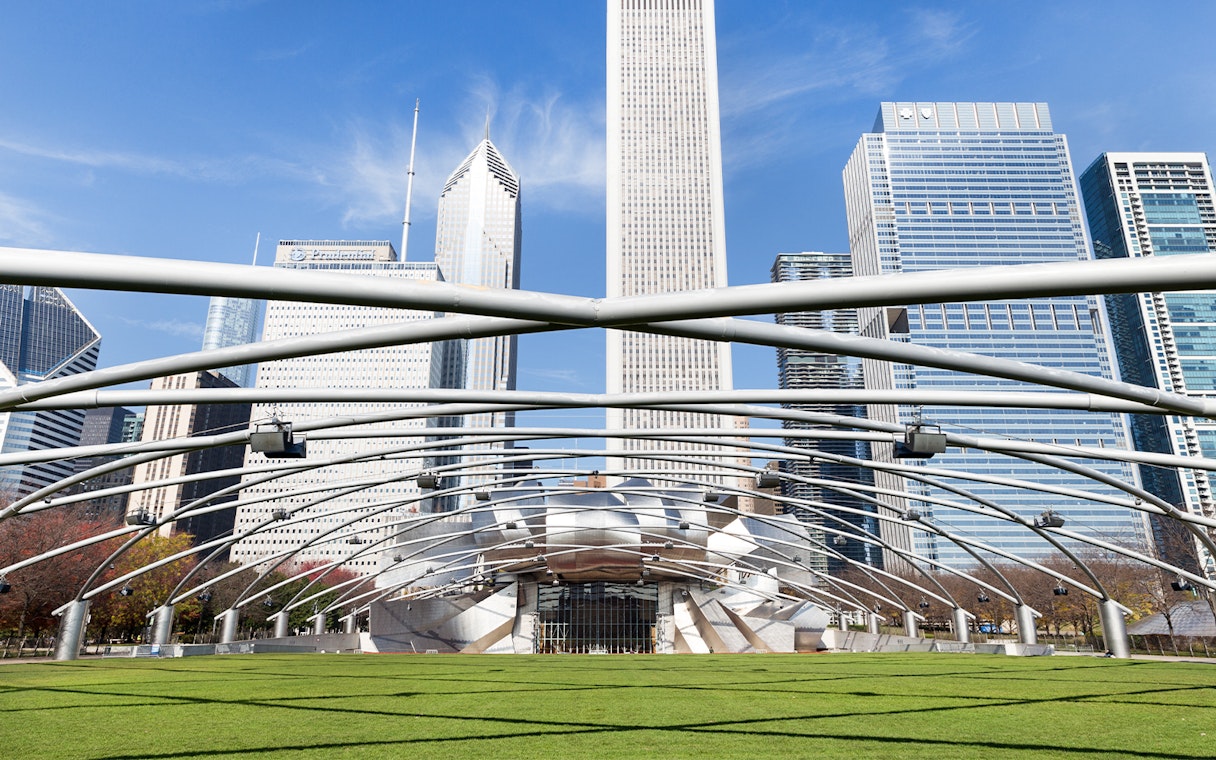 Millennium Park entrance with Chicago skyline in the background.