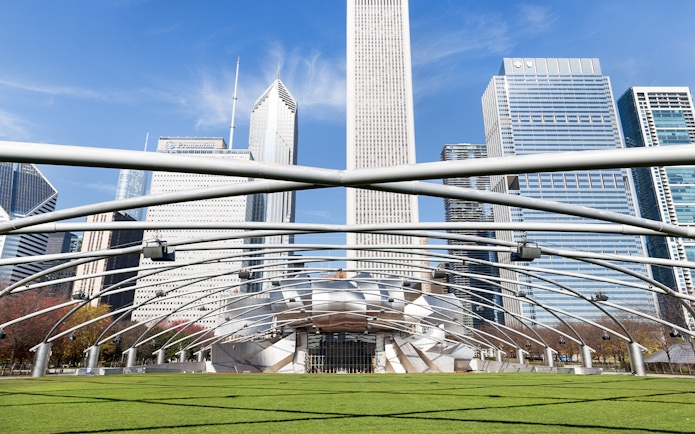 Millennium Park entrance with Chicago skyline in the background.