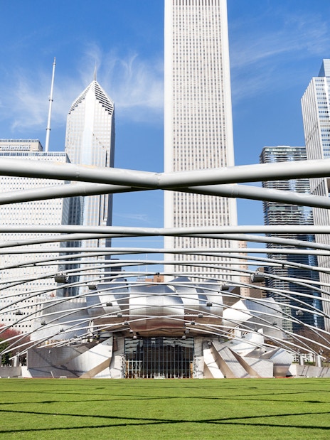 Millennium Park entrance with Chicago skyline in the background.
