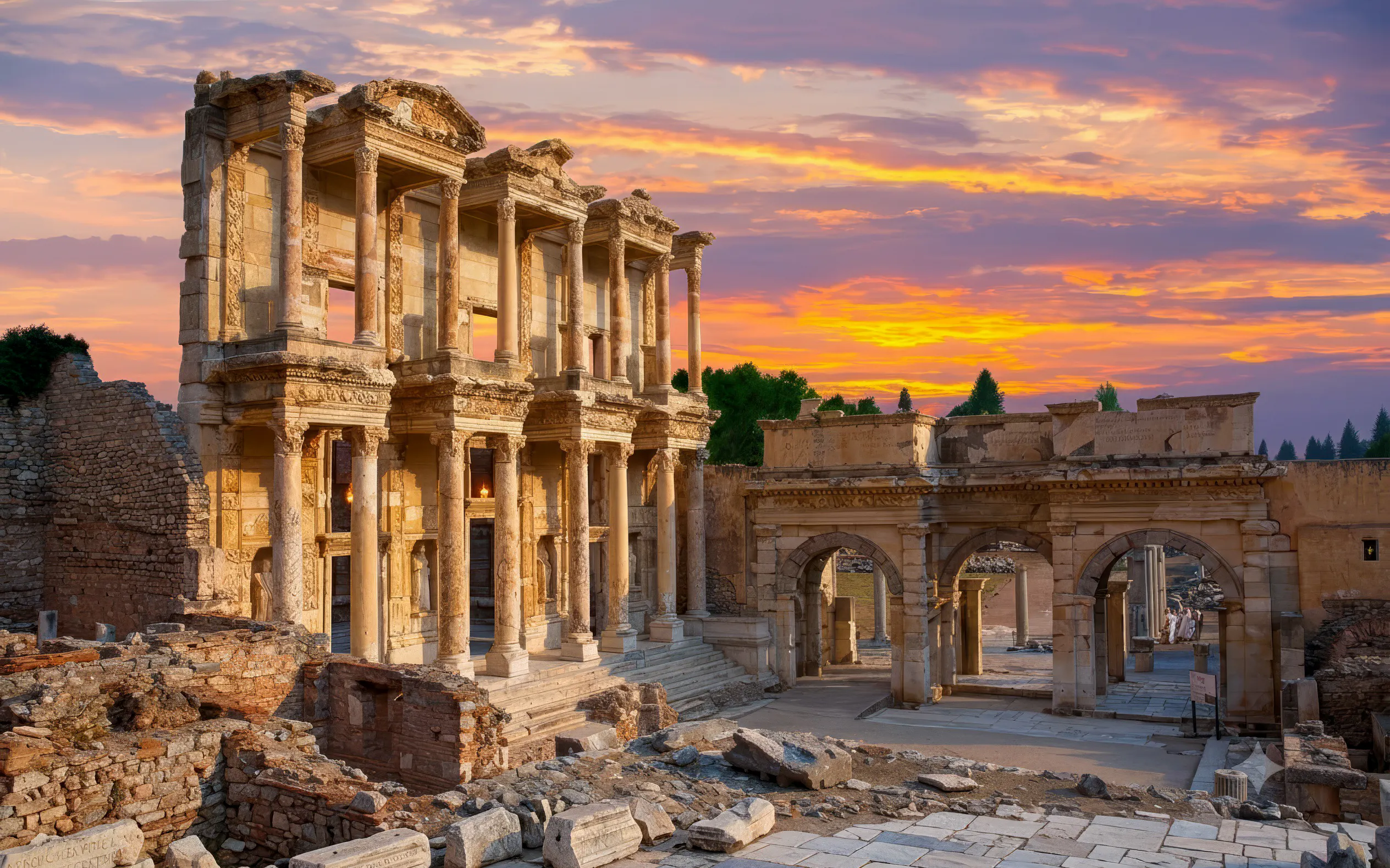 Ancient ruins of the Library of Celsus in Ephesus at sunset, part of the Ephesus & Pamukkale tour.