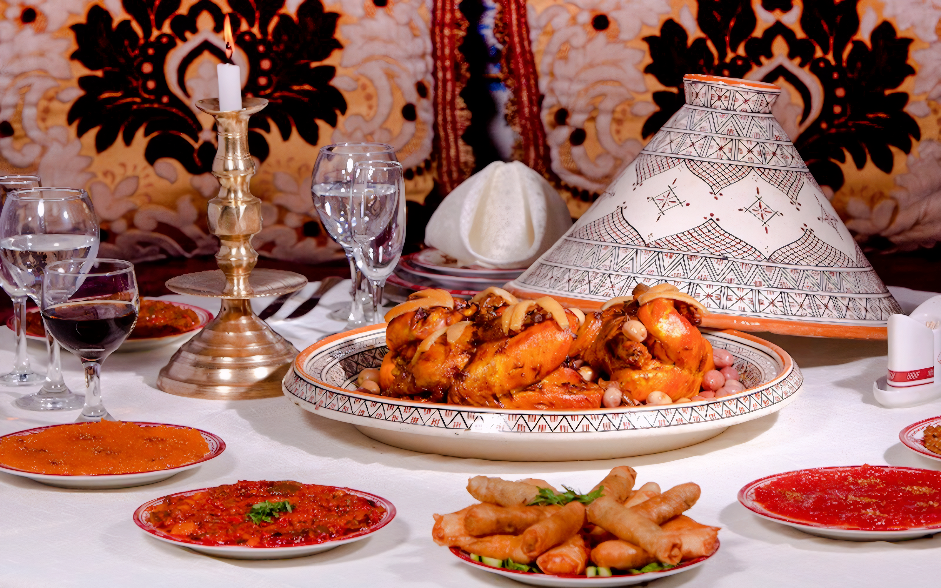 Moroccan feast with tagine and appetizers at Dar Essalam Dinner Show.