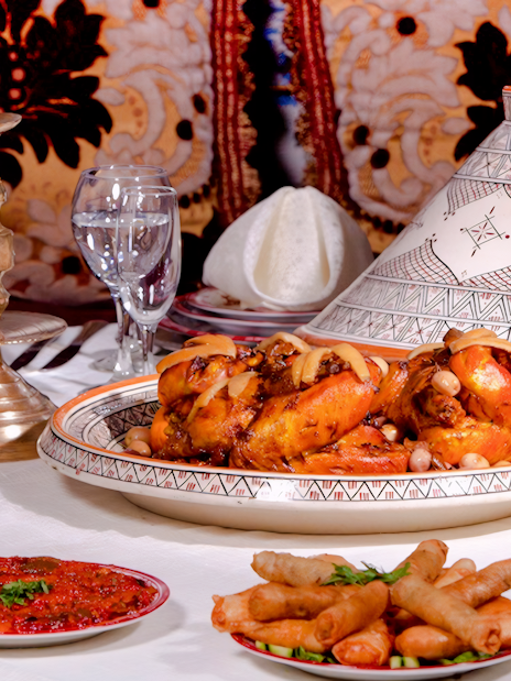 Moroccan feast with tagine and appetizers at Dar Essalam Dinner Show.