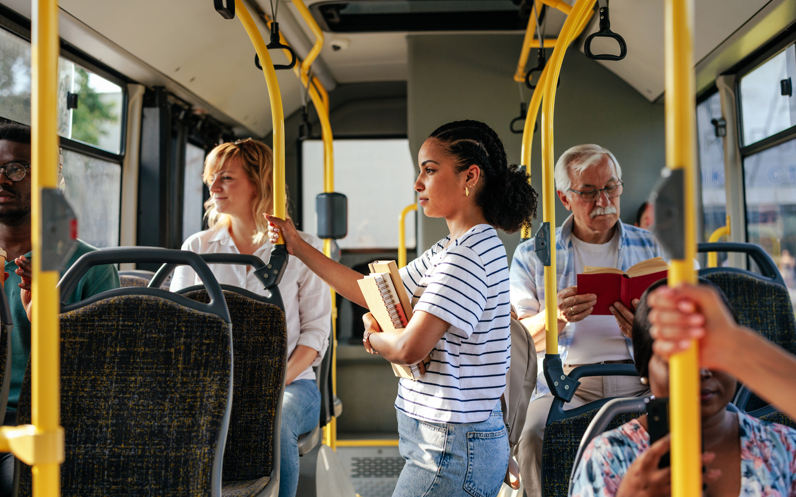 Visitors exploring the Blue Planet Aquarium's diverse marine life exhibits.