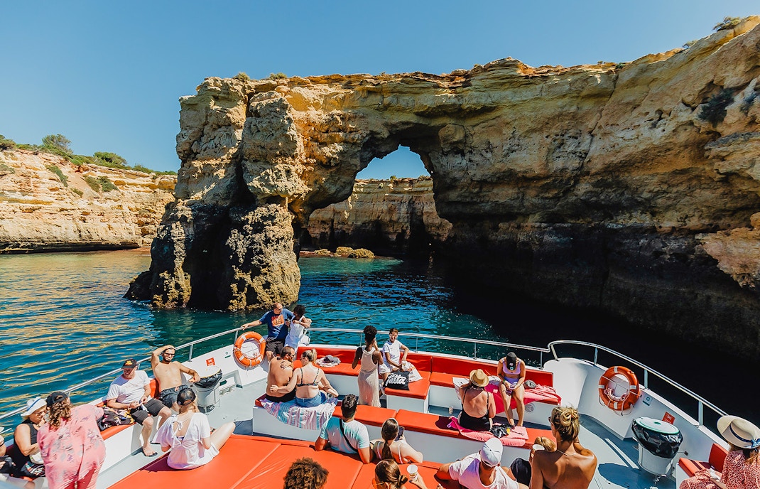 Benagil Caves and Algarve coastline viewed from a sightseeing cruise departing Albufeira.