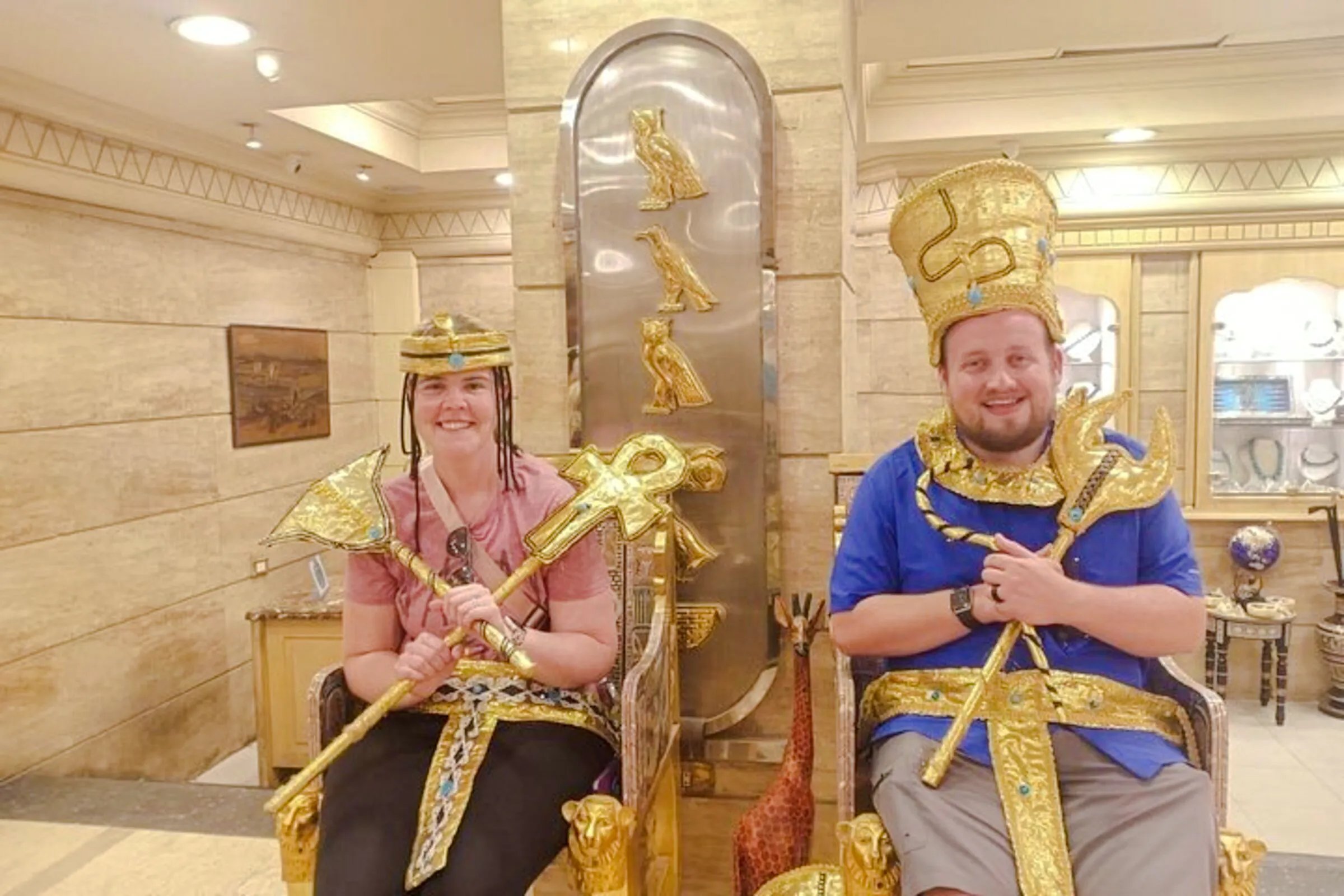 Visitors in pharaoh costumes at a shop in Khan el-Khalili, Cairo.