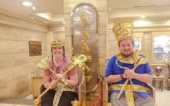 Visitors in pharaoh costumes at a shop in Khan el-Khalili, Cairo.
