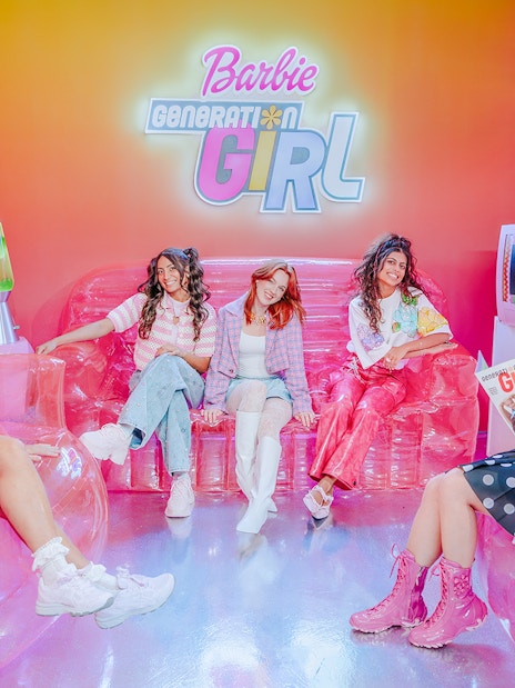 Guests enjoying the Barbie Generation Girls set with vibrant decor and retro elements.