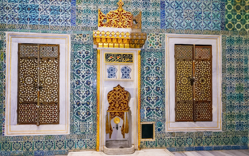 Topkapi Palace Harem fountain with intricate tile patterns and ornate gold details.