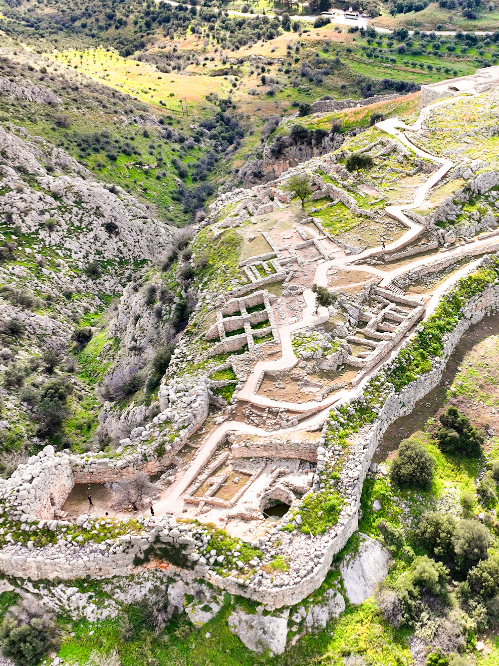 Ancient citadel ruins of Mycenae with pathways and stone walls, Argolida, Greece.