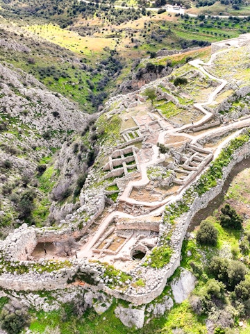 Ancient citadel ruins of Mycenae with pathways and stone walls, Argolida, Greece.