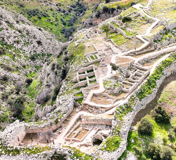 Ancient citadel ruins of Mycenae with pathways and stone walls, Argolida, Greece.