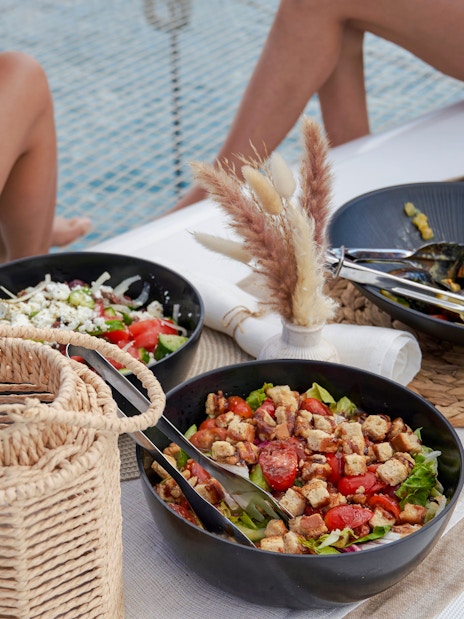 Food spread on catamaran cruise near Spinalonga, Crete.