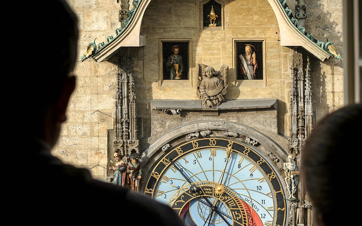 Visitors viewing the Prague Astronomical Clock at Praga Magica Interactive Exhibition.