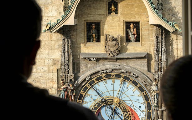 Visitors viewing the Prague Astronomical Clock at Praga Magica Interactive Exhibition.