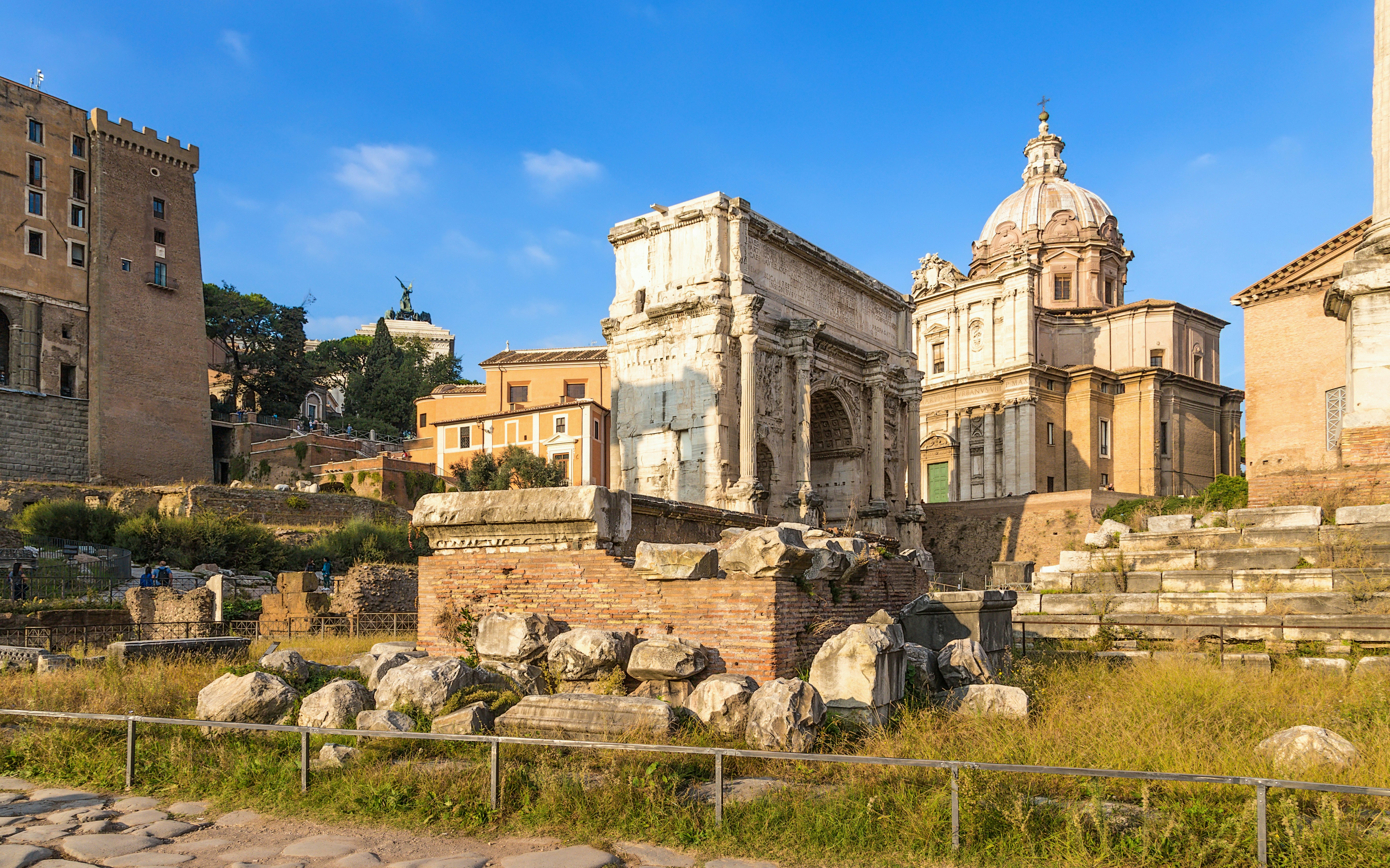 Ruins of Rostra and Arch of Septimius Severus at Roman Forum, Rome.