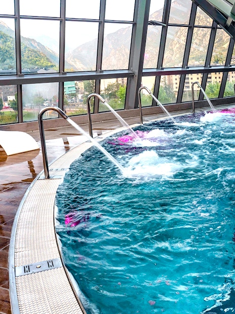 Caldea spa pool with mountain view, Andorra, showcasing Caldea Classic Entry experience.