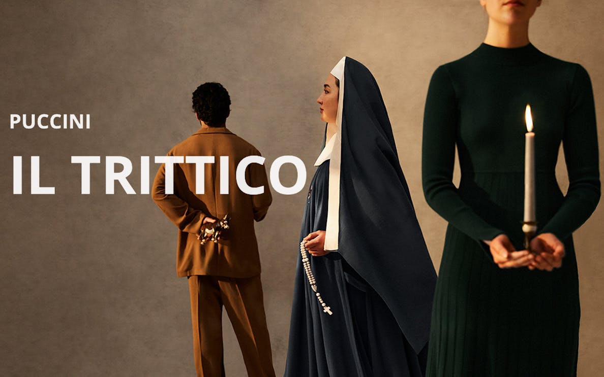 Puccini's Il Trittico characters in period costumes, one holding a candle.