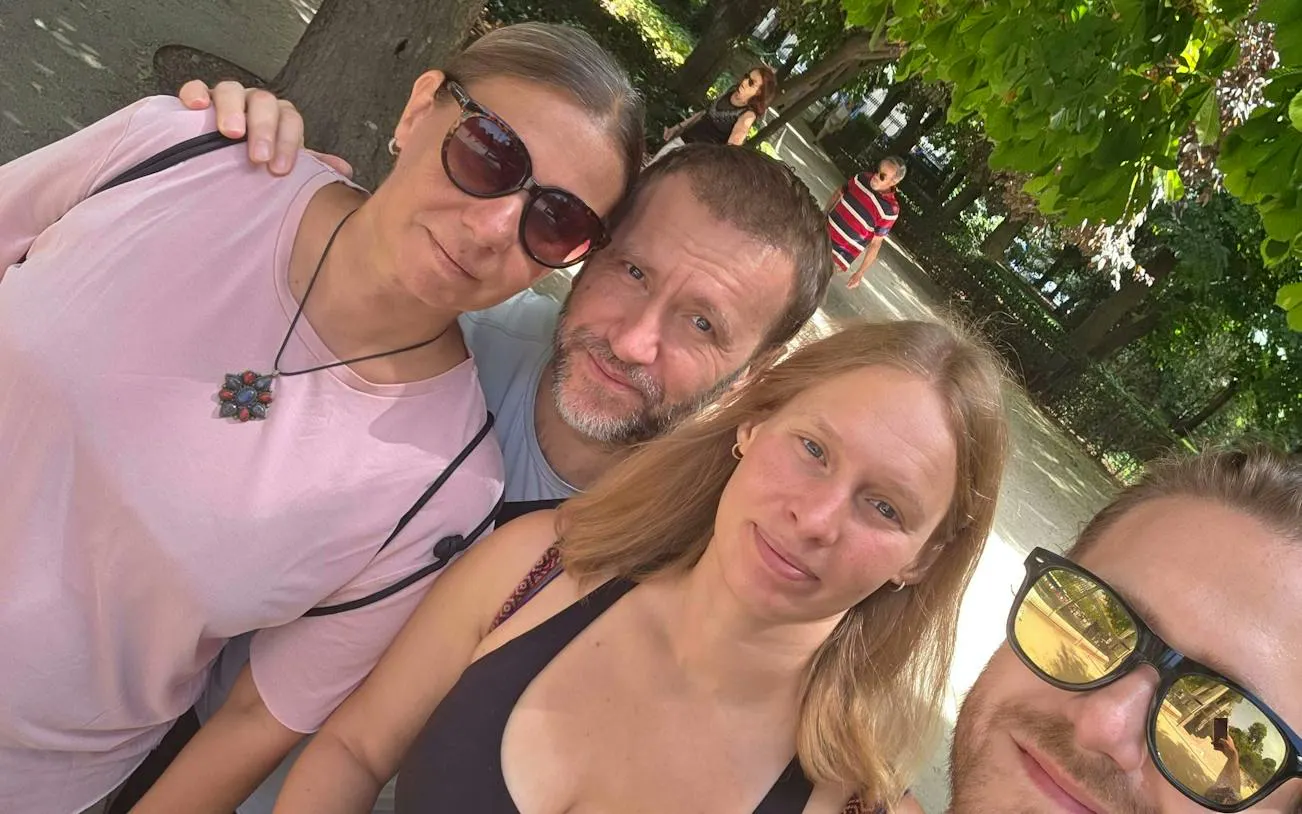 Group enjoying a sunny day at Retiro Park, Madrid during a self-guided city exploration game.