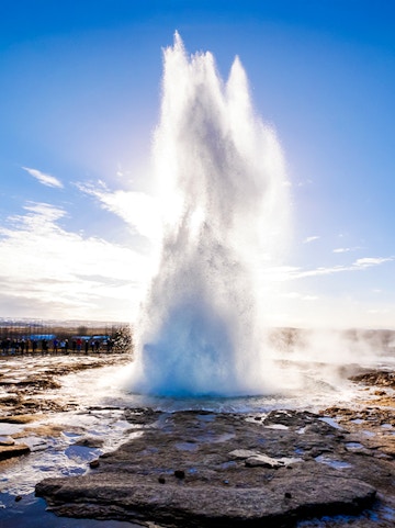 Geyser eruption at Strokkur on Reykjavik to Golden Circle tour, Iceland.