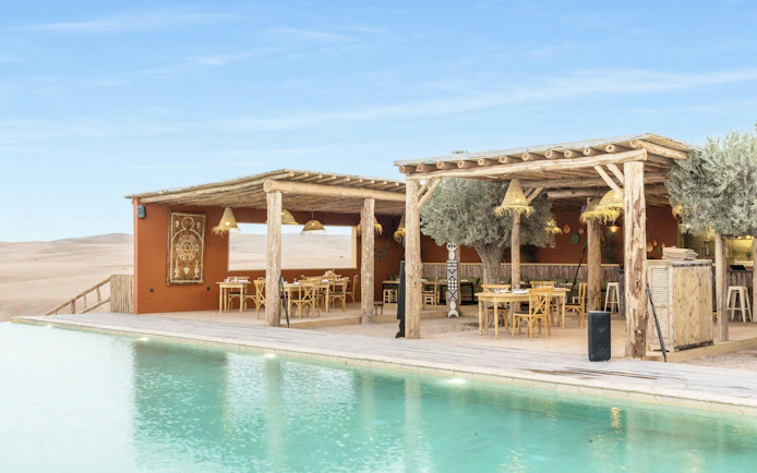 From Marrakesh: Sunset Agafay Desert Luxury Camp Experience with 3-Course Dinner, Pool Access & Dinner Show