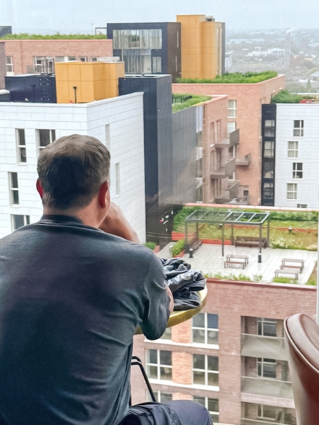 People enjoying drinks with city view at Gravity Bar inside Guinness Storehouse.
